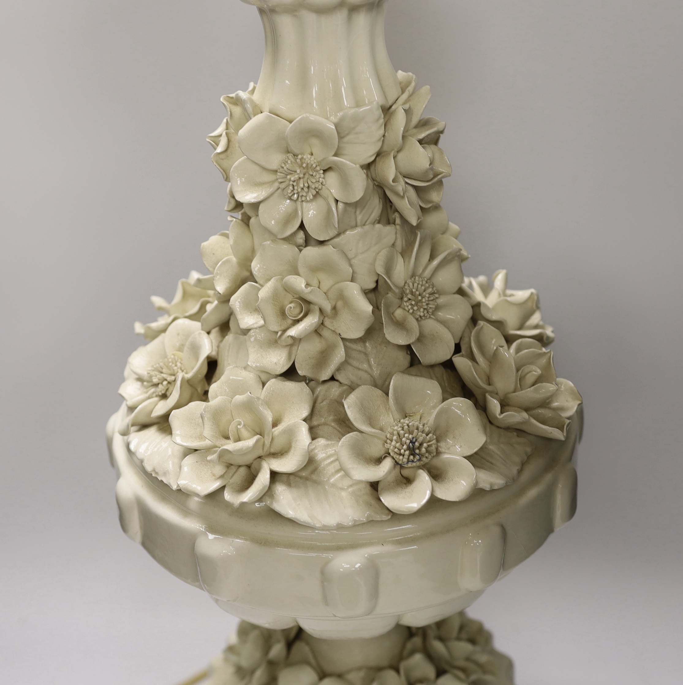 A large floral column table lamp on circular gilt base, 64cm high including the fitting